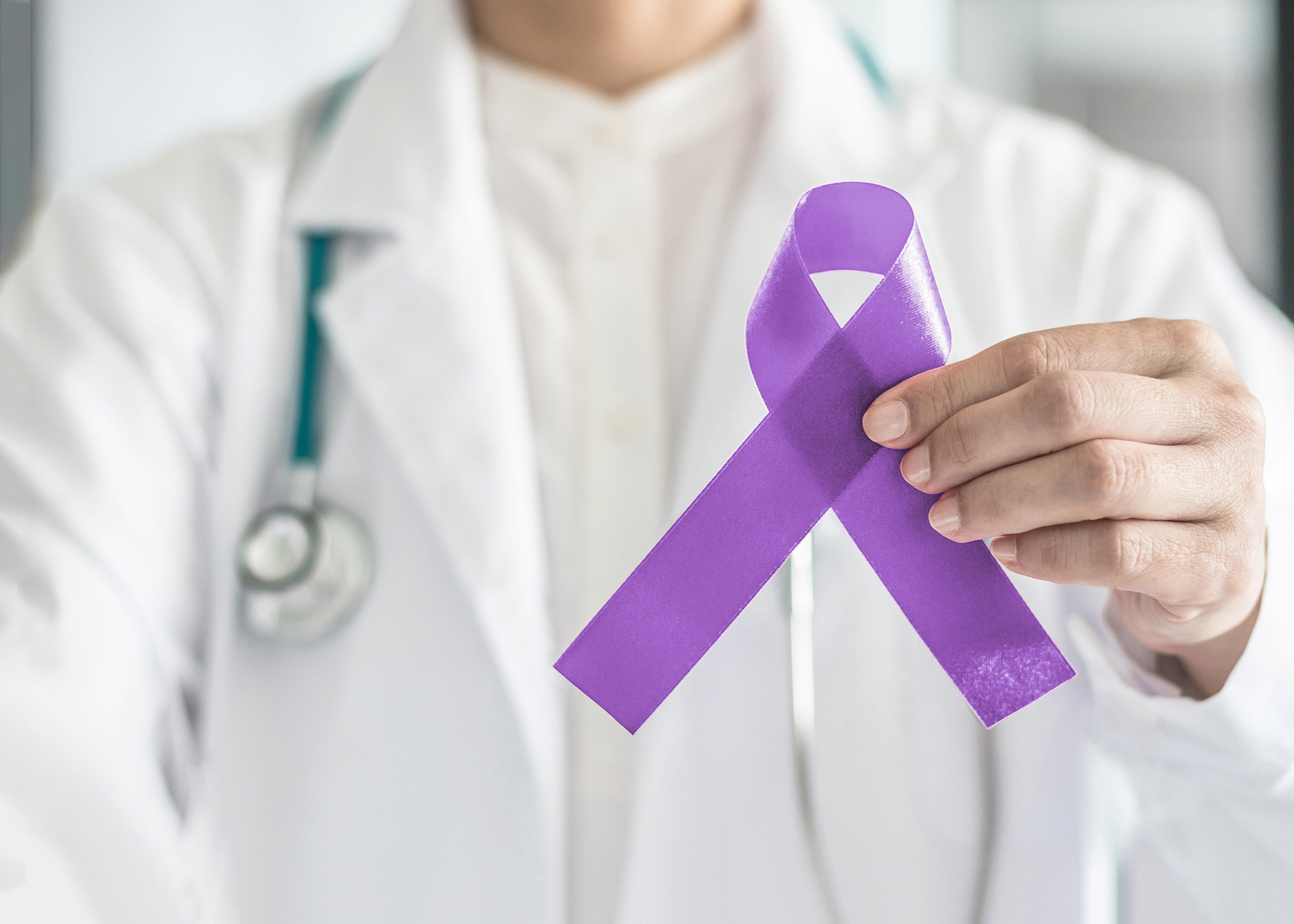 Purple ribbons and purple light mark World Cancer Day on February 4th